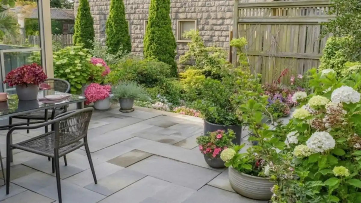 Fuchsia Overflow & Slate Stone Terrace – Container Chaos for Clean Lines