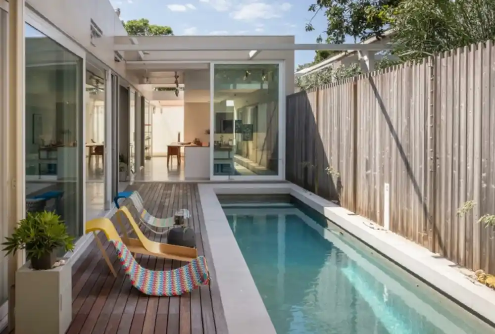 Sleek Aqua and Wood Lap Pool – Transforming Dead Space into a Private Resort