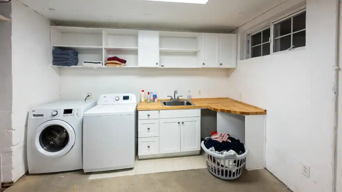 Bright & Functional Basement Laundry Nook - Conquering the Concrete Abyss