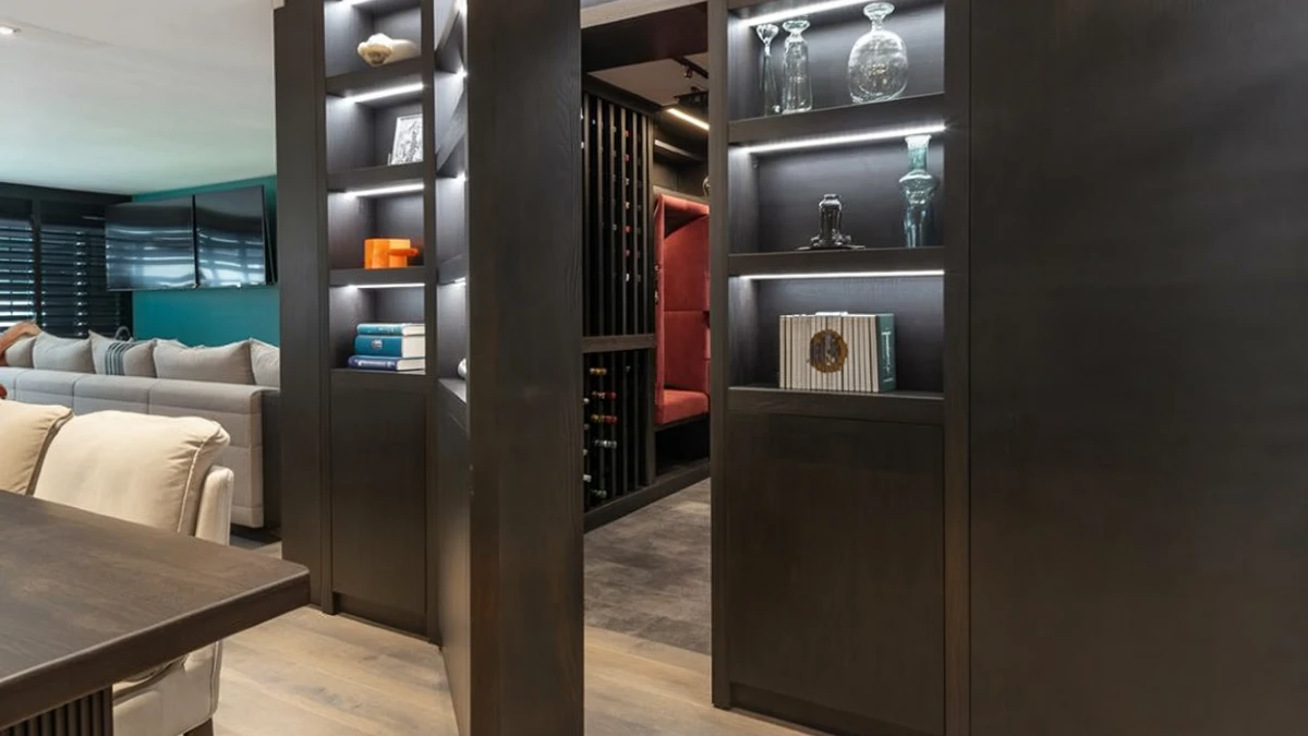 Moody Espresso Pivot Wall - A Secret Wine Cellar for Modern Entertaining