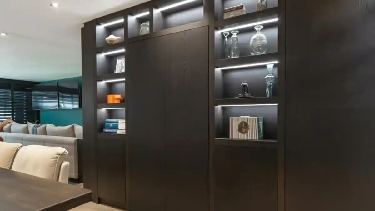 Moody Espresso Pivot Wall - A Secret Wine Cellar for Modern Entertaining