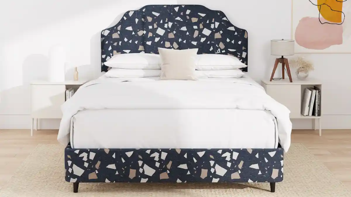 Navy Confetti Upholstered Bed – Anchoring a Neutral Room with Terrazzo Textiles