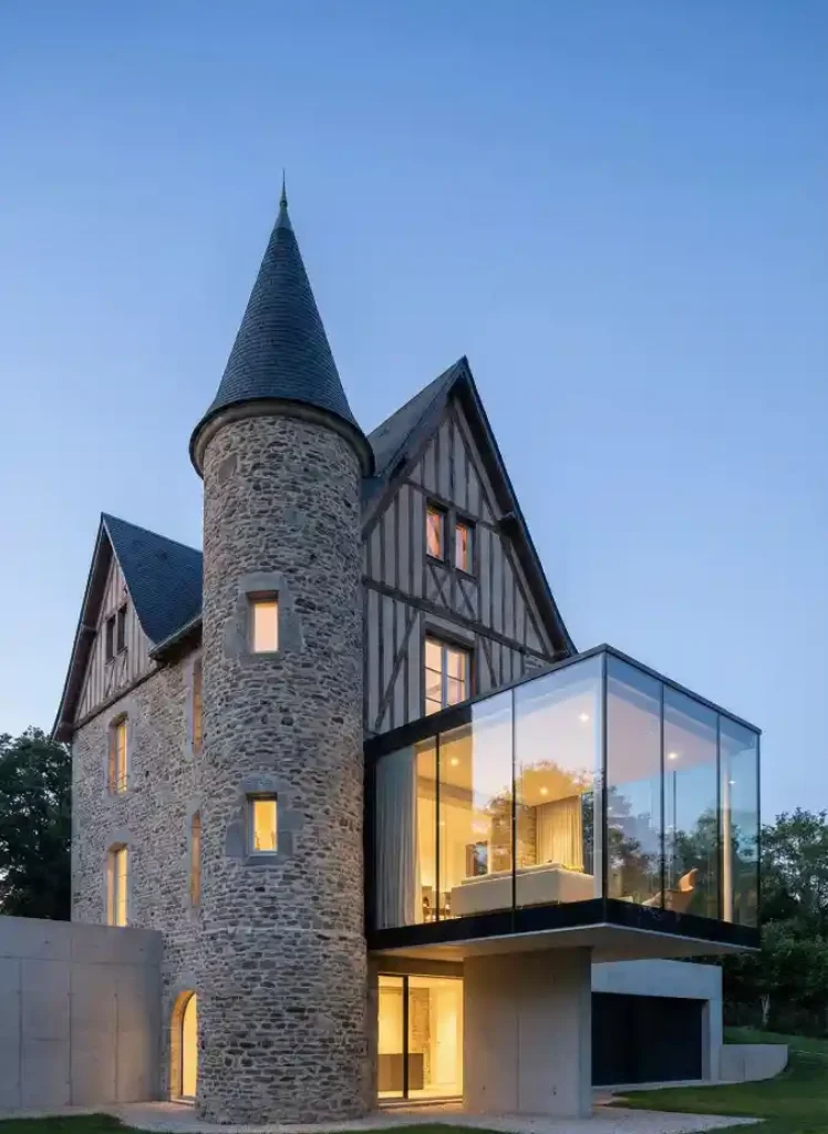 Cantilevered Glass and Rustic Stone Manor – A Bold Architectural Evolution