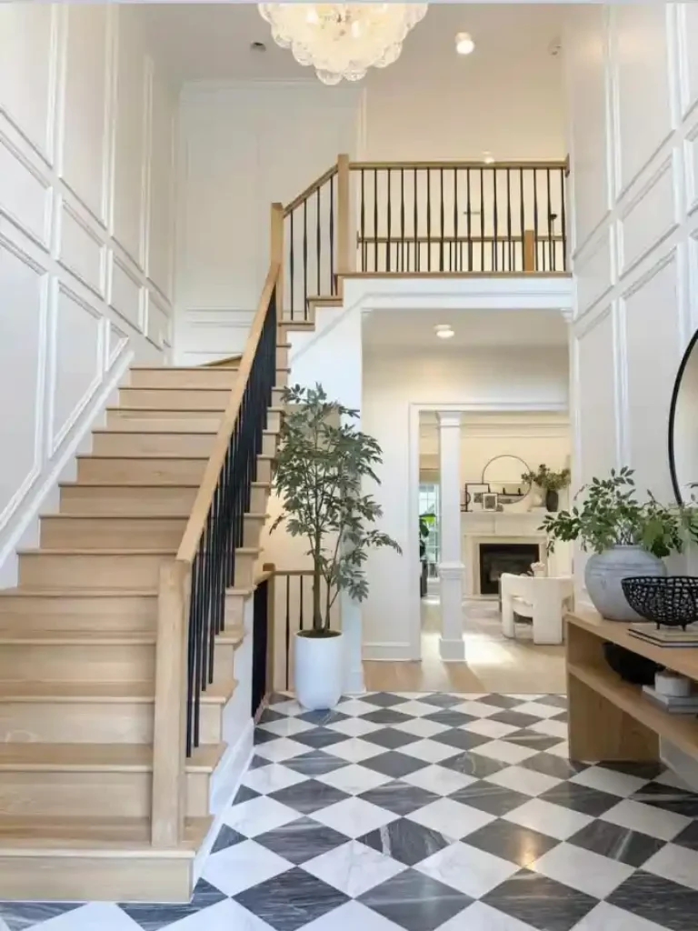 Checkerboard Elegance and Oak Grandeur - Mansion Foyer with a Sculptural Statement