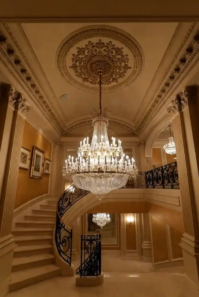 Gold and Crystal Grandeur - A Foyer Reimagined with Timeless Elegance