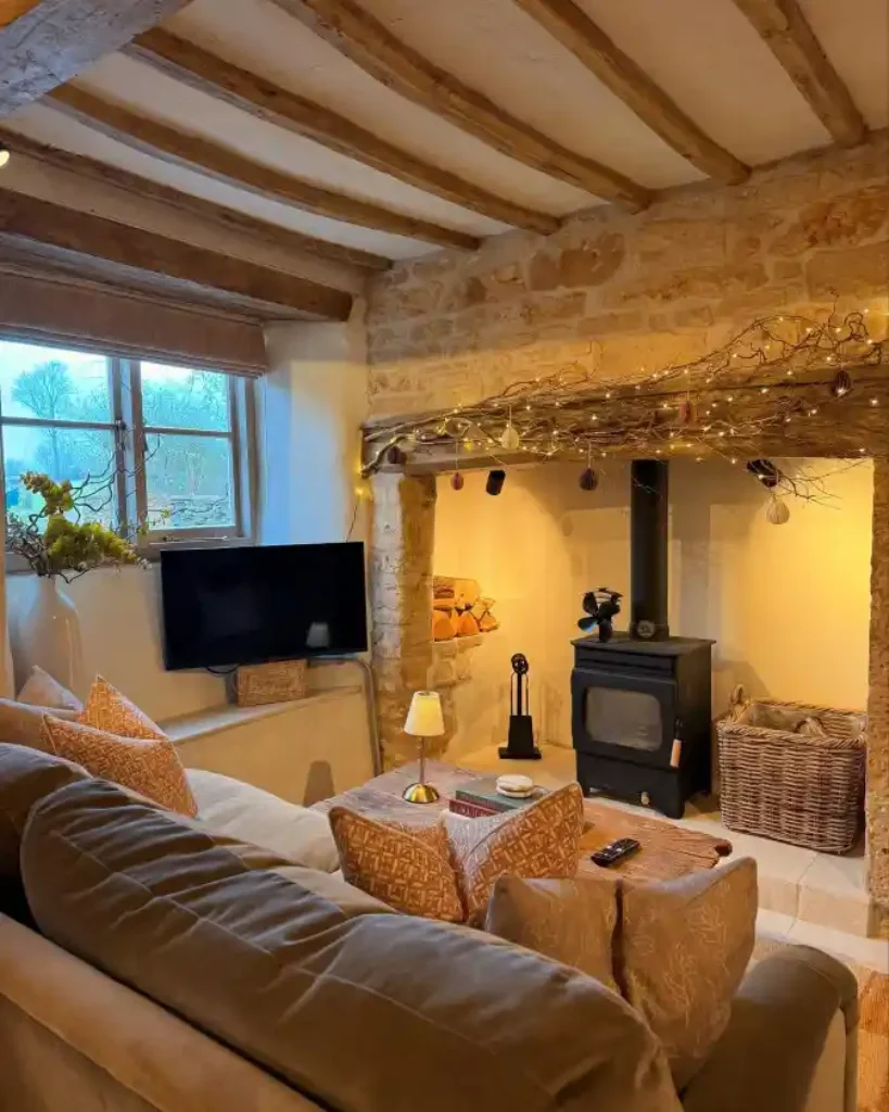 Rustic Stone and Timber Hearth Living Room – A Warm Embrace for Fairytale Living