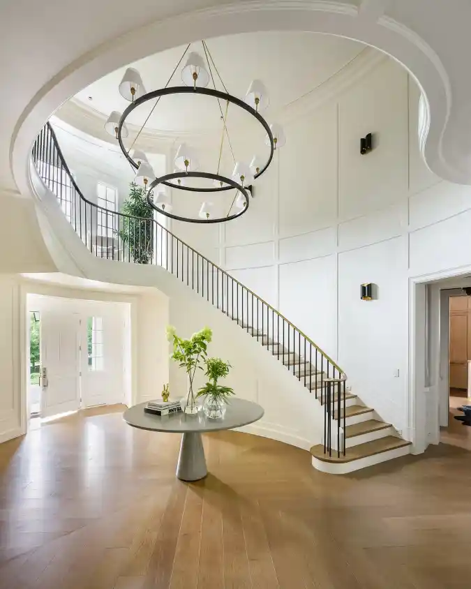 Sculpted Curves and Circular Glow - Grand Mansion Foyer with a Modern Twist