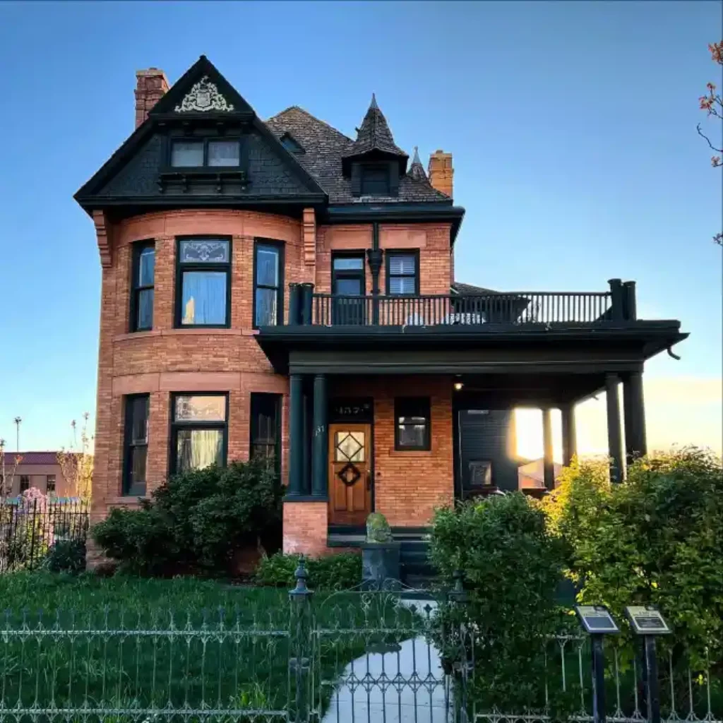 Spiced Brick and Gothic Charcoal Turreted Manor – Blending Victorian Flair with Medieval Fortification