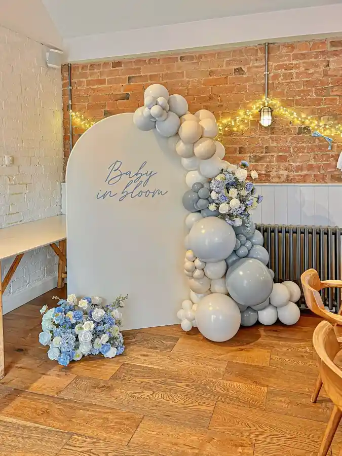 Dusty Blue Arches and Organic Cascades - A Modern Twist on Baby in Bloom