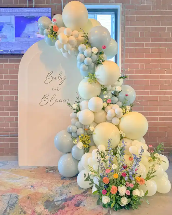 Sage and Soft Cream Garden Arch - A Whimsical Entrance for a Baby in Bloom Celebration