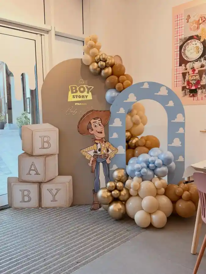 Sky-High Sentiment Toy Story Themed Baby in Bloom Shower Decor